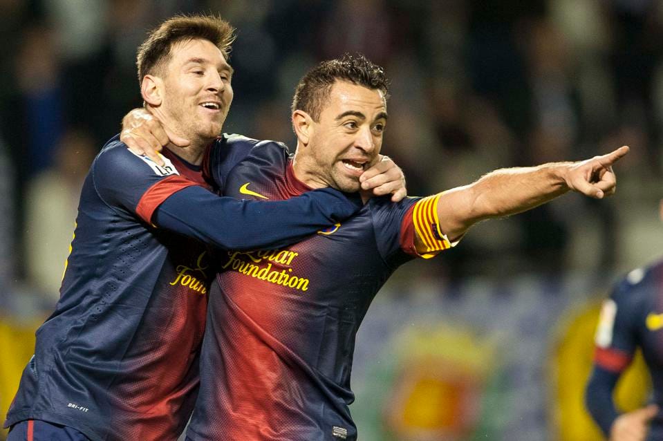 Xavi and Lionel Messi